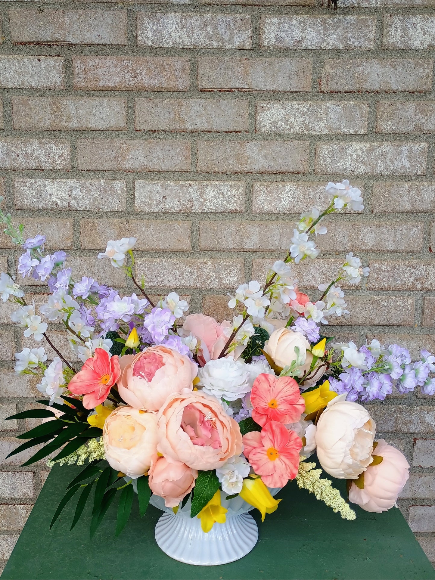 PAIR OF FAUX ARRANGMENTS